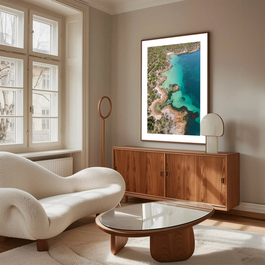 Drone view over Honeymoon Bay and surrounding bays in vivid blue and green hues.