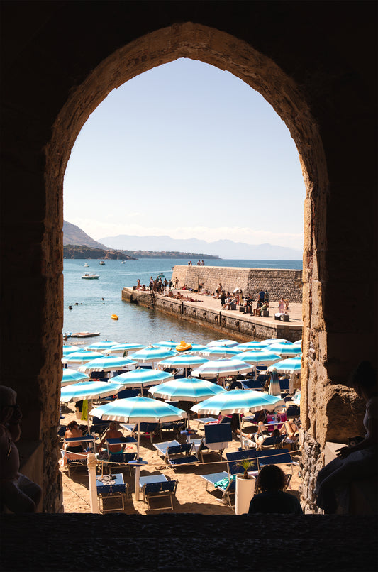 Porta Pescara, Cefalù portrait coastal photography print taken in Cefalù, Sicily, showing the historic stone archway leading to Spiaggia del Porto Vecchio.