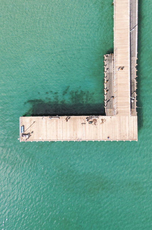 Top-down aerial print of the L-shaped end of Frankston Pier on Port Phillip Bay – coastal wall art