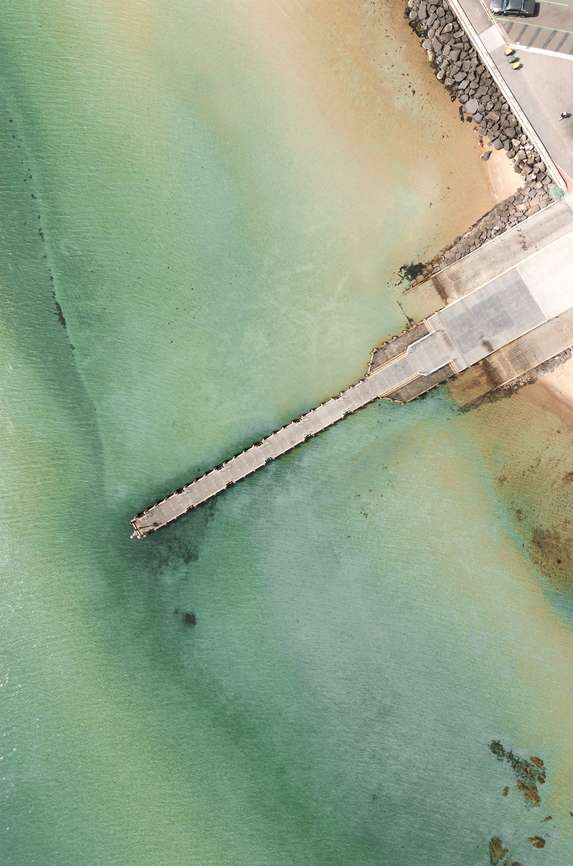Top-down aerial print of the Olivers Hill jetty and rock wall at Frankston, Port Phillip Bay – coastal wall art