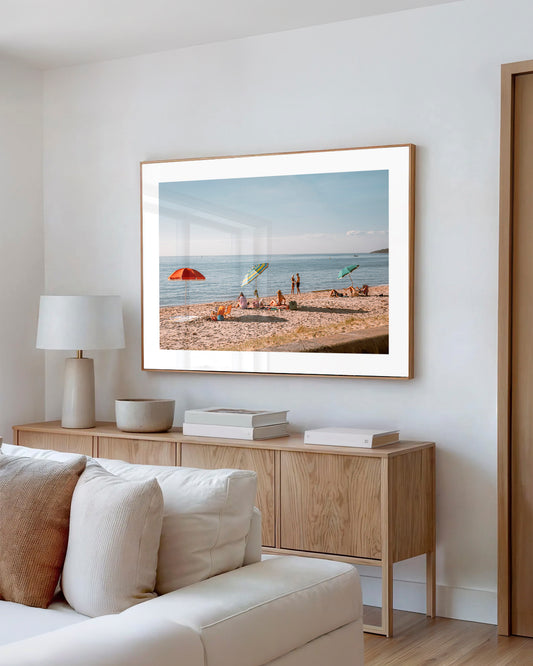 Dromana Beach Mornings print in a natural oak frame styled in a living room